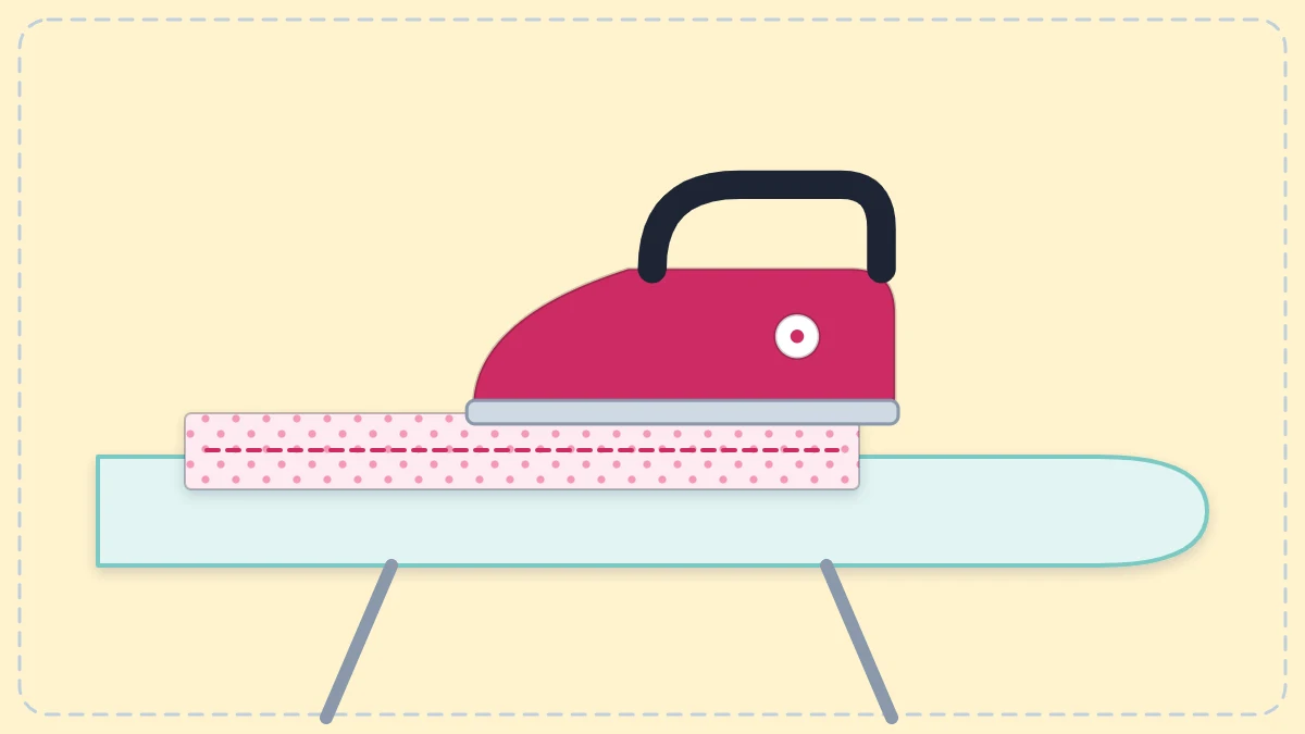 An iron resting on fabric on an ironing board, over a sewn seam