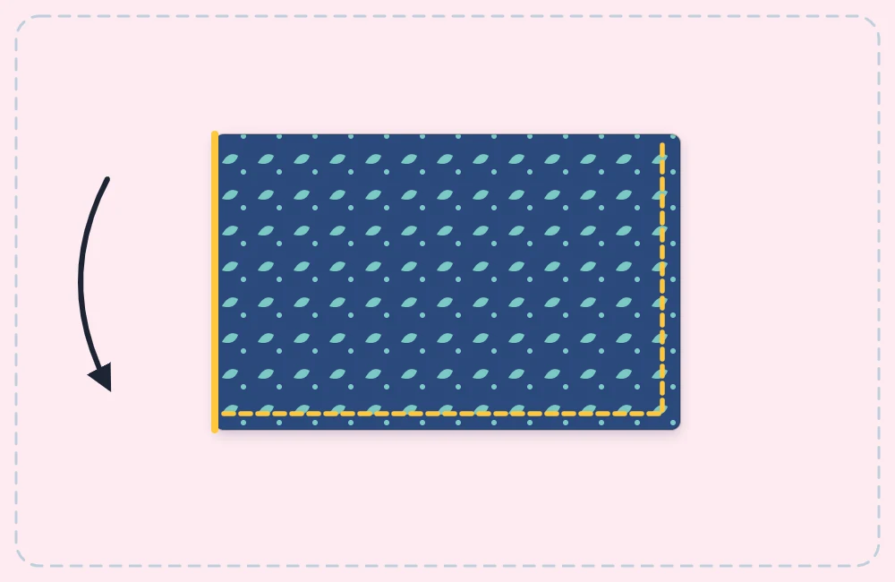 Padded fabric rectangle folded in half with a line of stitching along the bottom and one side
